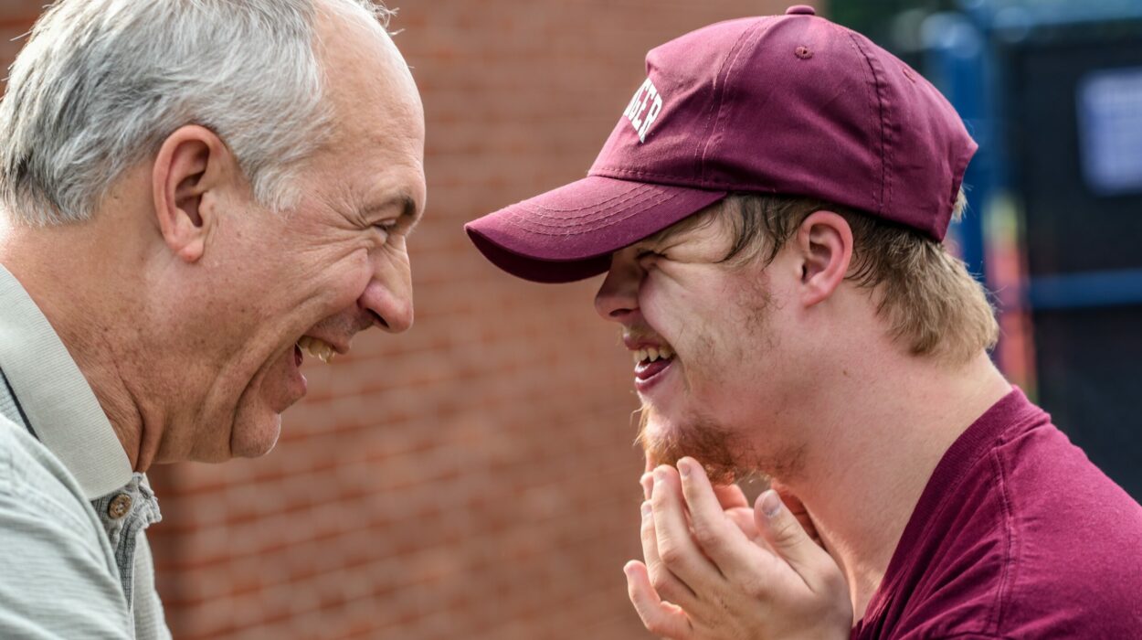 Father and son laughing together