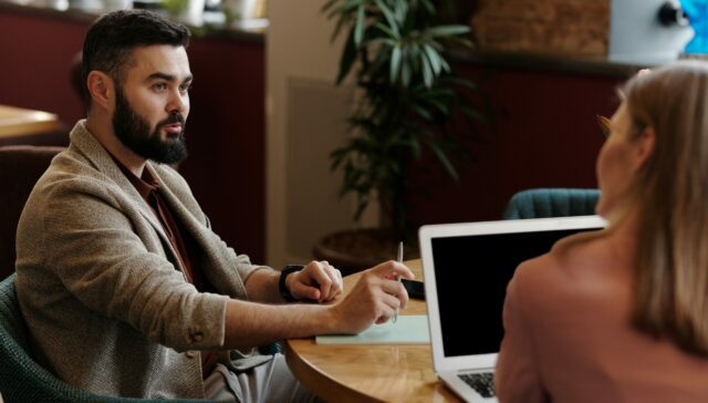 Business meeting between man and woman