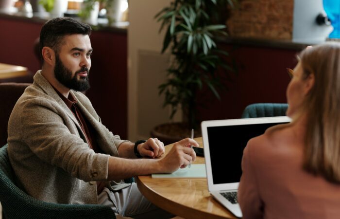 Business meeting between man and woman