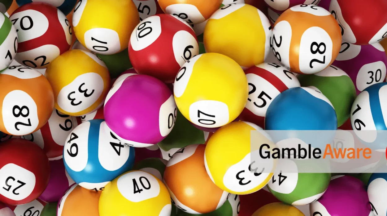 A lot of lottery balls. In the bottom-right corner is the 'GambleAware logo, and the 18+ only logo