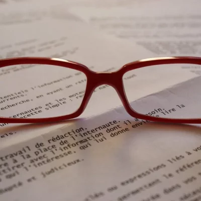 reading-1584273_1280 Glasses sit on typed paper