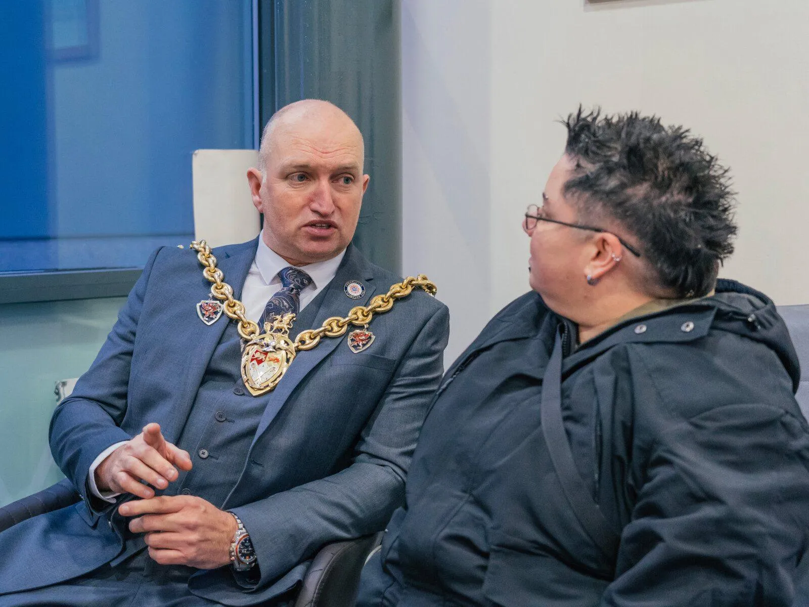 BJC05119 Two people talking. The two people are Cllr Andy Williams and Abigail Gibson