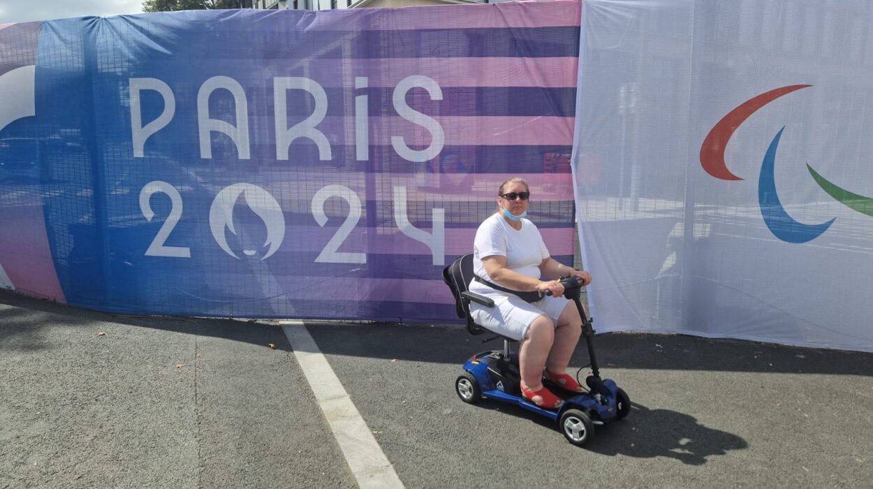 ShopMobility in Paris with Paula Fortune on a boot scooter