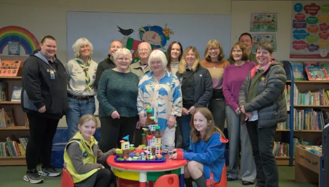 A group photo of all recipients of the money. 1st Moss Scouts (Sue Mort), Friends of Moss Valley, The Rainbow Foundation (Claire Partridge and Ian Pope), Brynteg Library, AVOW (Jo Young), 1st Brynteg Guides Rainbows and Brownies (Catriona Kempster) and members of the retiring members of the Broughton Community CIC (Eva Thomspon and Irene Jones).