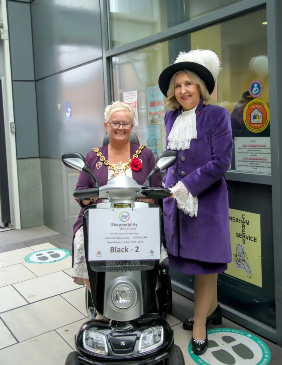 Shopmobilty 10 Years - Cllr Tina Mannering, Mayor of Wrexham on a scooter and High Sheriff of Clwyd Julie Gillbanks Shopmobilty 10 Years - Cllr Tina Mannering, Mayor of Wrexham on a scooter and High Sheriff of Clwyd Julie Gillbanks
