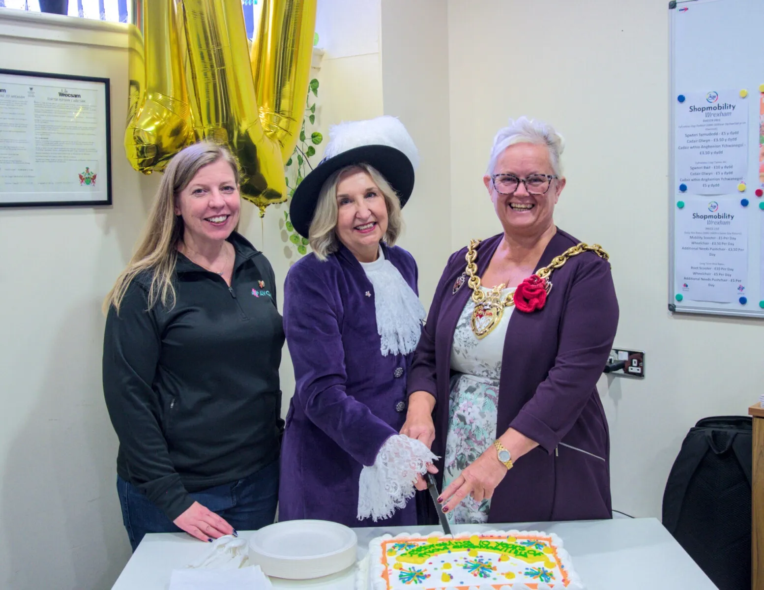 Shopmobility 10 Years - Dawn Roberts-McCabe, High Sheriff of Clwyd Julie Gillbanks, Mayor of Wrexham Cllr Tina Mannering Shopmobility 10 Years - Dawn Roberts-McCabe, High Sheriff of Clwyd Julie Gillbanks, Mayor of Wrexham Cllr Tina Mannering