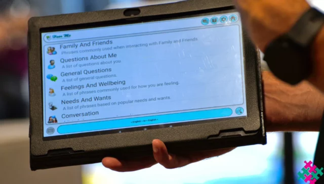 A hand holding a RITA Device