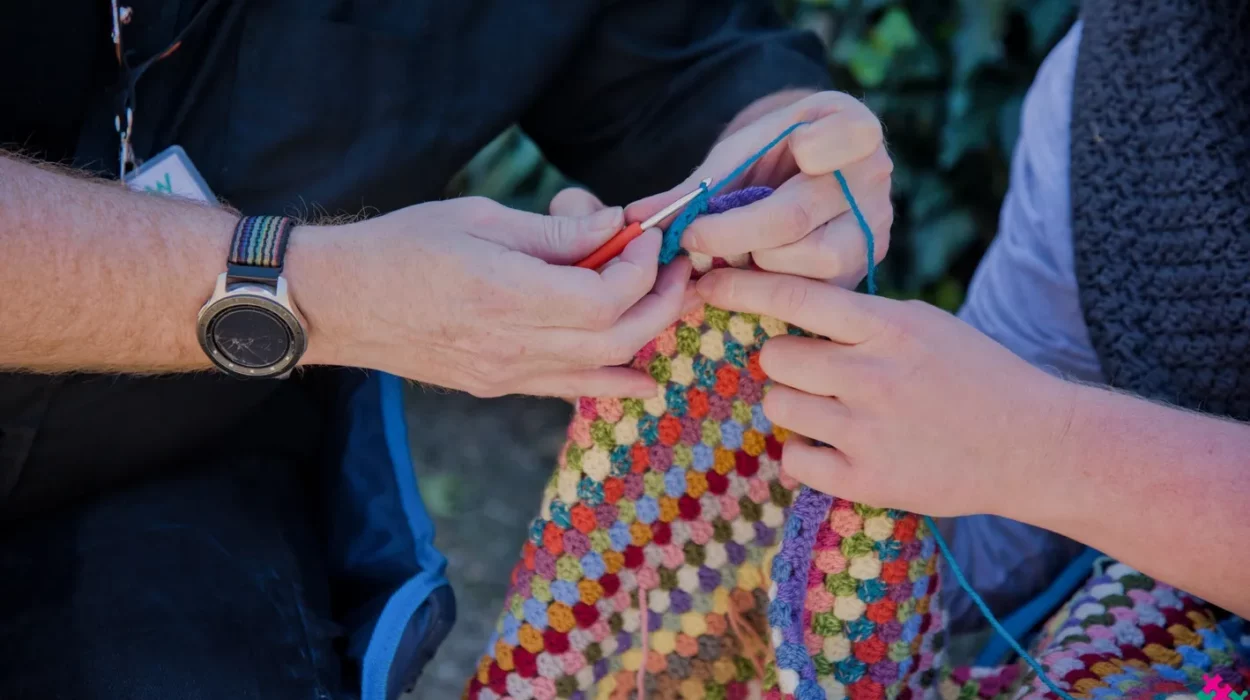 Intergenerational Week - Erddig - Phil learning to Crochet