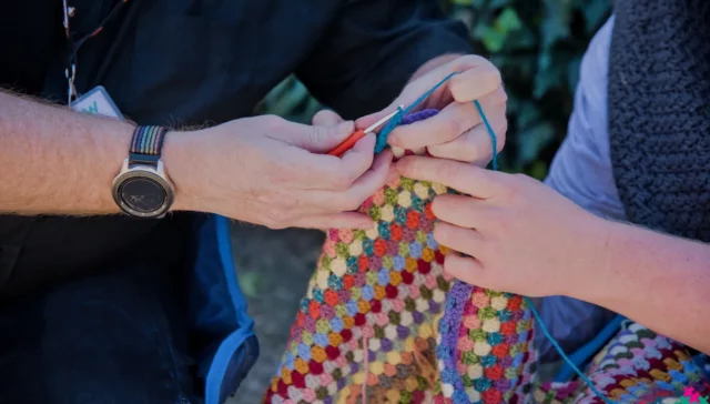 Intergenerational Week - Erddig - Phil learning to Crochet